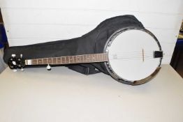 Godman banjo with Remo Weather King skin together with a padded case