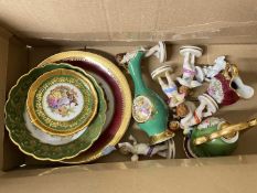 Box of Limoges gilt decorated plates and saucers, continental cherub models and other items