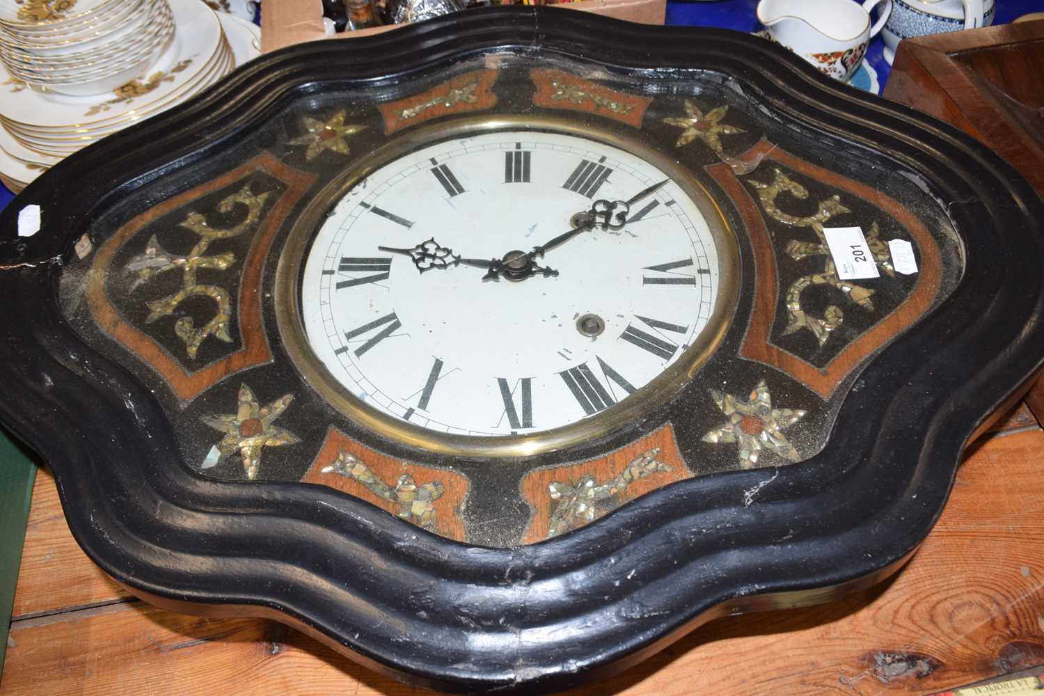 Late 19th Century French vineyard clock set in a mother of pearl inlaid and ebonised case