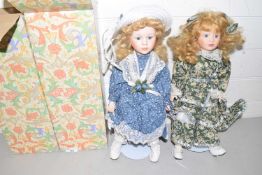 Two boxed collectors dolls