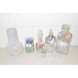 Mixed Lot: Vaseline glass decanter with cover together with further floral decorated decanters and