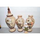 Mixed Lot: Set of three opaque floral decorated glass vases and a milkmaid figure (4)