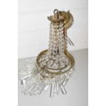 Three tier centre ceiling light fitting with glass prismatic drapes