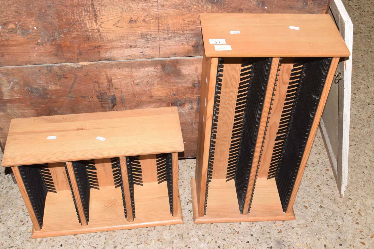 Two light wood CD racks