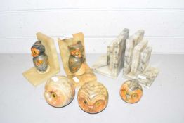 Two pairs of italian alabaster book ends together with three polished marble owls head models