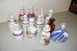 Collection of various ceramic and glass scent bottles