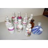 Collection of various ceramic and glass scent bottles