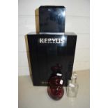 Large Givenchy shop display perfume bottle together with a further glass scent bottle and a