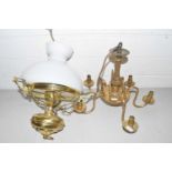 Hanging brass oil lamp style light fitting together with a brass five branch light fitting