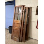 A group of five oak and pine glazed internal doors