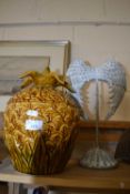 Pineapple tureen together with a pair of decorative free standing angel wings