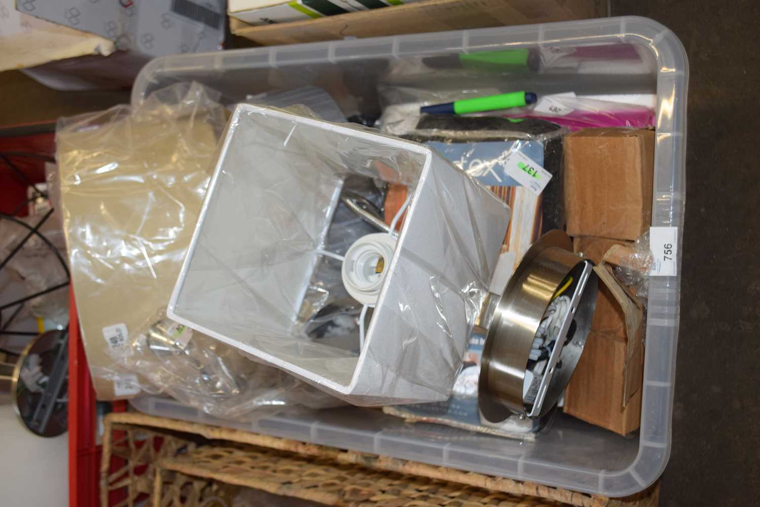 Box of household items to include wall lamps, lampshades and other items