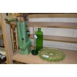 Green glazed table mincer together with a quantity of green glass ware