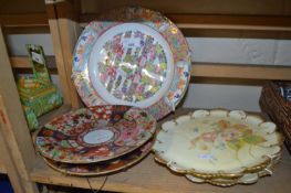 Two Imari style plates together with two floral decorated plates and another (5)