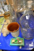 Two glass demi johns, stone ware items etc