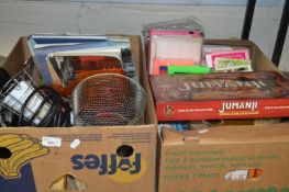 Mixed Lot: Two boxes of assorted items to include board games, toys, ceramics, garage lighting,