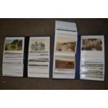 Two albums of assorted postcards