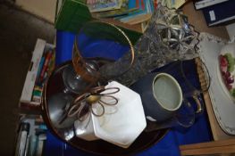 An oval wooden tray together with glass ware and other vases