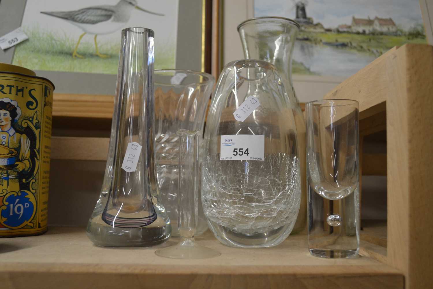 Quantity of mixed glass ware to include a carafe, crackle glaze vase, spill glasses and others