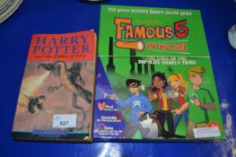 Copy of Harry Potter and the Goblet of Fire together with Enid Blyton's Famous Five, On The Case