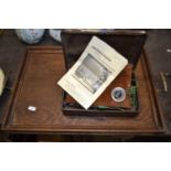 Vintage home electrolysis kit and a wooden tea tray