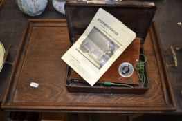 Vintage home electrolysis kit and a wooden tea tray