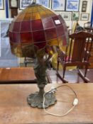 Figural table lamp with leaded glass shade