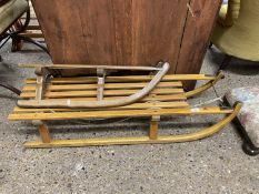 Wood sledge marked Davos plus one other smaller (2)