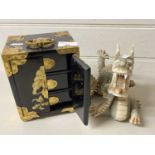 Modern Oriental black lacquered jewellery box and a accompanying modern Chinese dragon figure