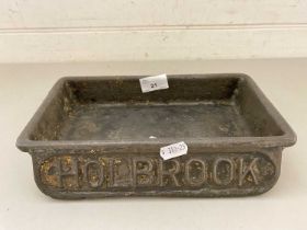 Small cast iron bowl possibly for a dog marked 'Holbrook'