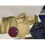 Devichands of New Delhi, a khaki green shirt with shorts, belt, socks and pith helmet and a