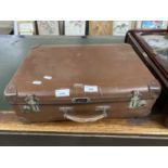 Small brown suitcase