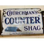 Enamel advertising sign 'Churchmans Counter Shag, The Best Lasts Longest', 76cm wide