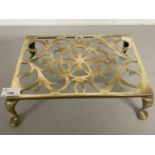 Brass four footed trivet
