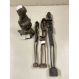 Mixed lot comprising three small East African hardwood figures together with a bronzed resin model