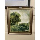 A gilt framed coloured print