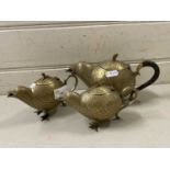 An Indian brass novelty three piece tea set formed as birds