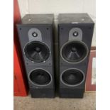 A pair of large B&W speakers