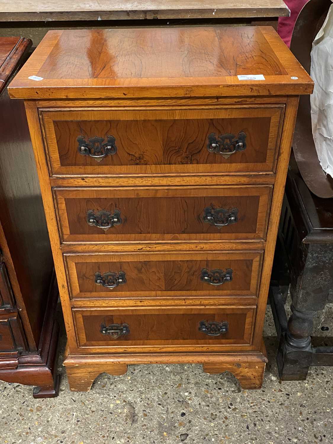 Small yew wood veneered four drawer chest, 45cm wide