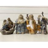 Group of four 20th Century Chinese pottery figures