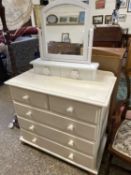 White painted pine five drawer chest together with an accompanying dressing table mirror (2)