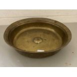 Large circular brass bowl