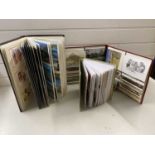 Three albums of various modern postcards to include Royal Mail issues