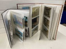 Two albums of various assorted postcards