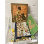 Box of vintage jigsaw puzzles, vintage building blocks etc