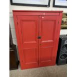 Red painted pine two door cupboard, 85cm wide