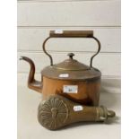 Vintage copper kettle and a copper shot flask