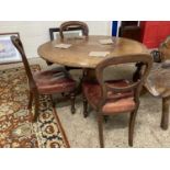 Mahogany and cross banded pedestal dining table together with three balloon back dining chairs (4)
