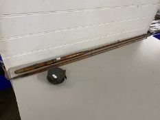 Warner & Sons Makers Redditch three piece cane fishing rod together with a brass centre pin reel,