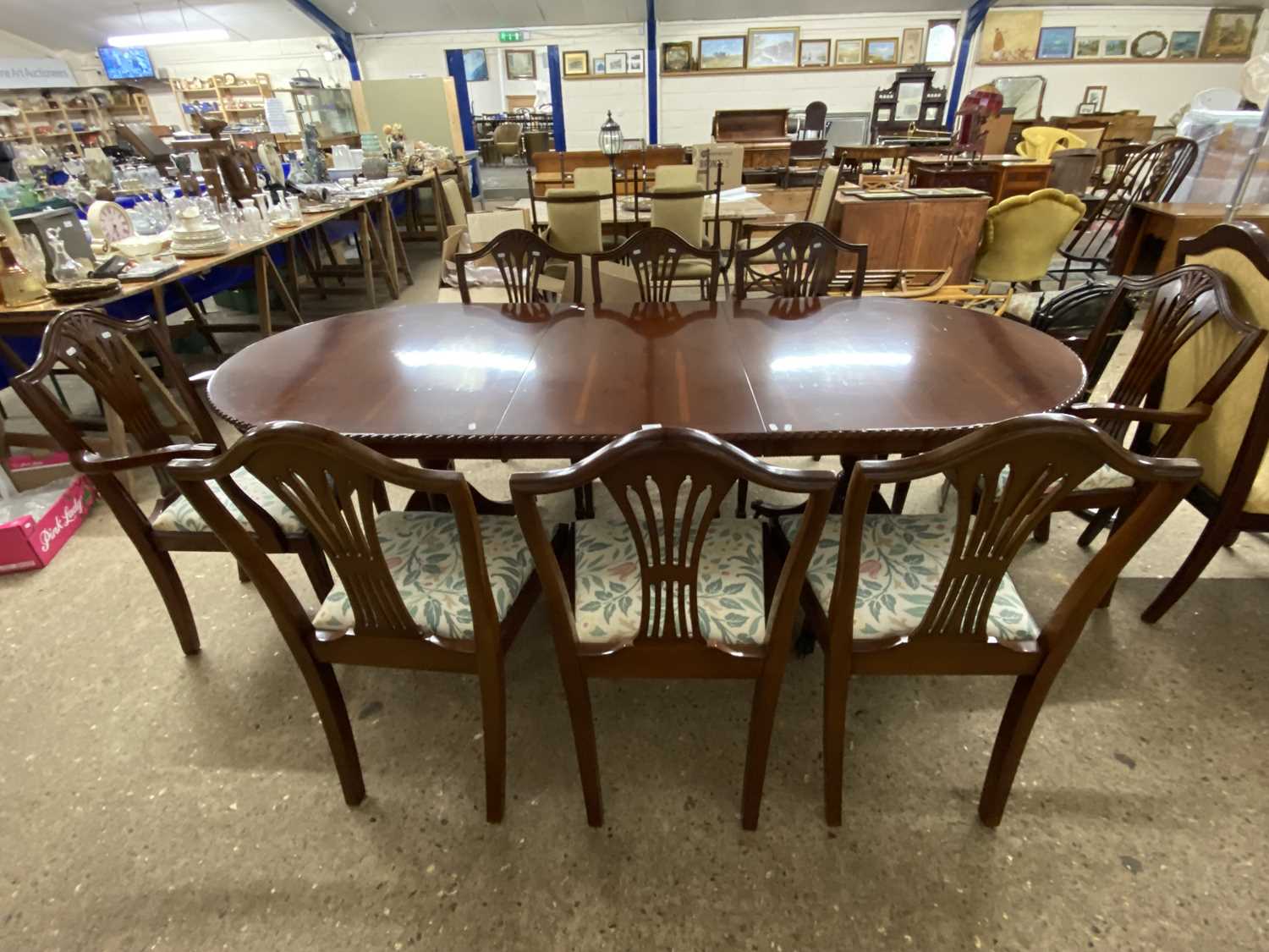 Modern yew wood veneered extending dining table and eight accompanying chairs - Image 2 of 2